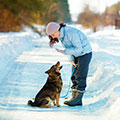 Woman and Dog in snow