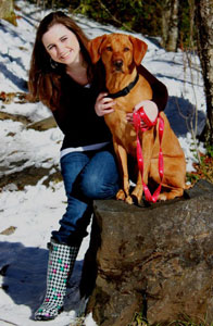 Abi and Mr. Darcy posing in the snow