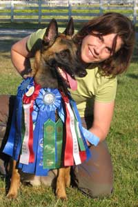 Debbie and Jaz with agility ribbons